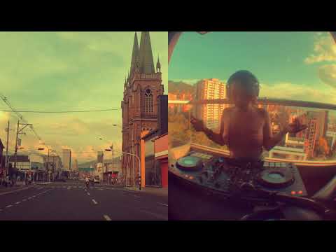 DJ Missydi Mixing Music in Medellin Apartment Rooftop