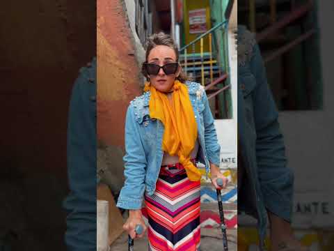 Using Forearm Crutches To Climb Comuna 13 in Medellin