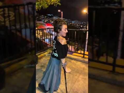 Empowering Walk: Woman Navigates Medellín Comunas with Forearm Crutches 💪 #IndependentLiving